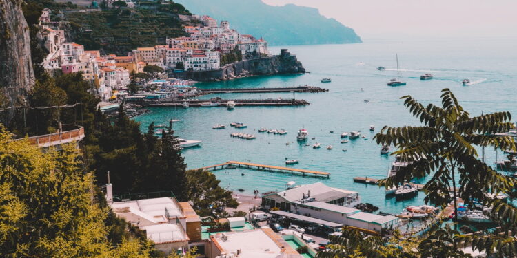 landscape photo of village houses near ocean