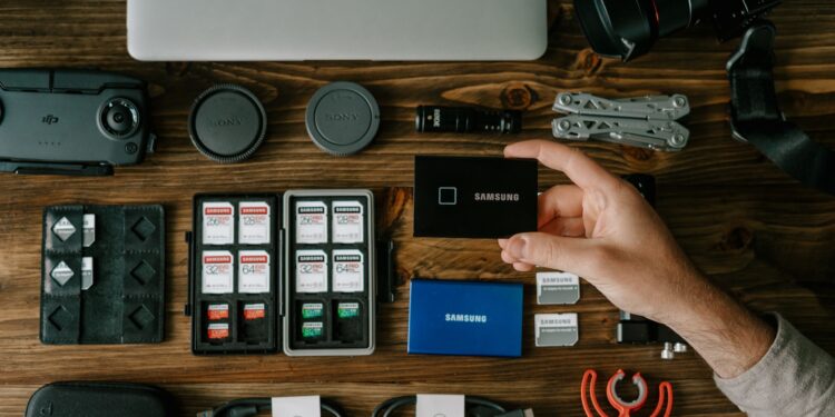 person holding blue and white box