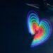 multicolored heart LED light on wall