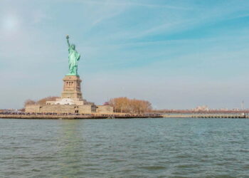 Statue Of Liberty on island surrounded by water