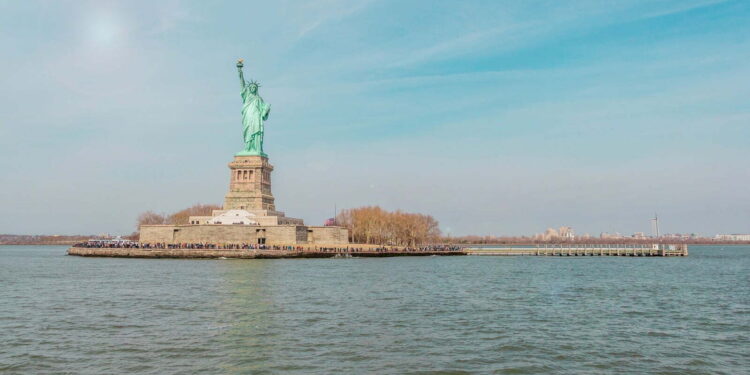 Statue Of Liberty on island surrounded by water