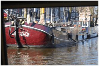 Boat and canal in Amsterdam