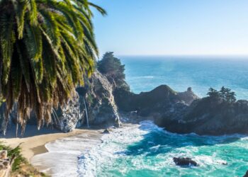 aerial photography of boulders on body of water
