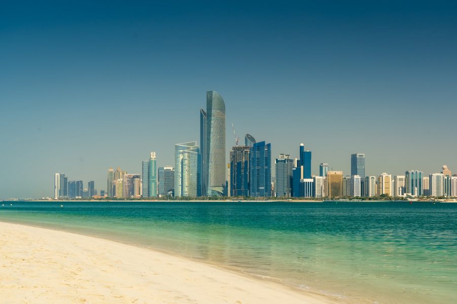 city skyline across the sea during daytime