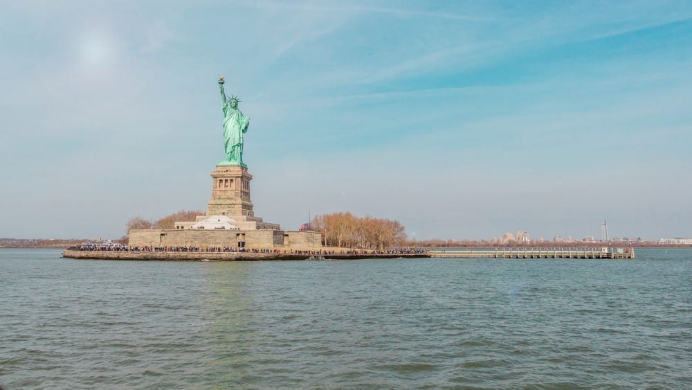 Statue Of Liberty on island surrounded by water